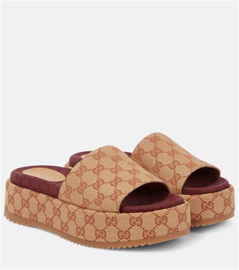 women gucci original gg canvas slides|Gucci original slides.